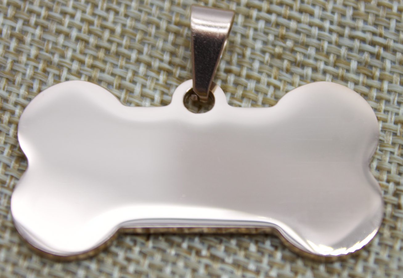 Lemmikin nimilaatta luu ruusukulta