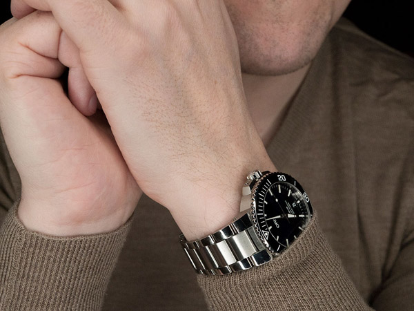 Oris Aquis Date Black worn on the wrist 